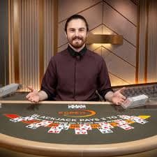 Slot game interface showing stake selection and paytable information